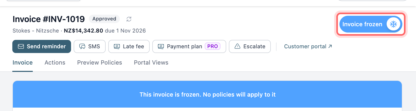 An invoice page with the Invoice frozen switch highlighted and the frozen banner below it